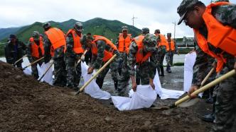 国防部：解放军和武警部队有力有效完成防汛救灾工作