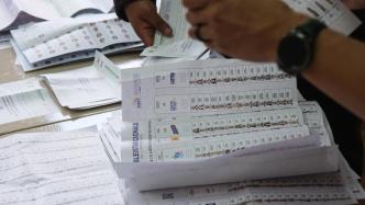 厄瓜多尔提前大选：所有候选人穿防弹衣投票，首轮未出现胜者