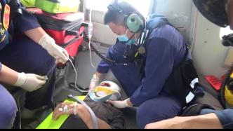 长江口附近海域一渔民头部受伤，救助直升机首次携医务人员前往救助