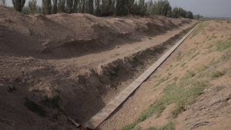 沿着河湖看新疆丨横穿沙丘的新时代“坎儿井”