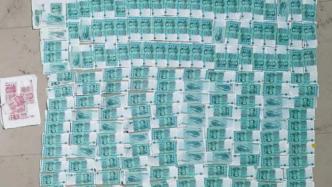 多个印刷假币窝点被端，其中一个缴获假人民币2.03亿元