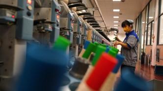 人民日报评论员：努力实现全年经济社会发展目标