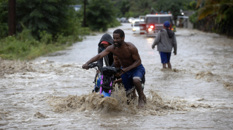 多米尼加暴雨灾害已致21人死亡，超1.3万人被迫转移