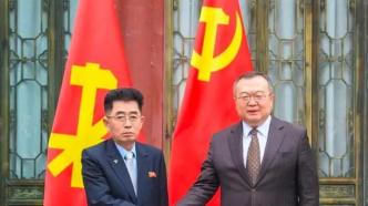 刘建超同朝鲜劳动党中央国际部部长金成男举行会谈