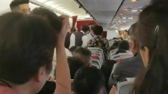 央广网评女子躺座椅致航班延误：对个人和飞行安全的极不负责