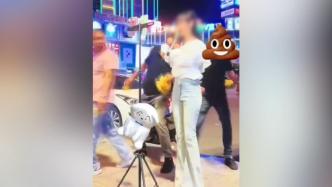 晋江警方通报“残疾女子街头直播遭男子拍臀”：男子被行拘