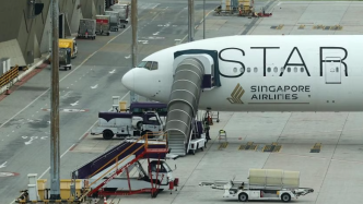 新航遇险客机已返回新加坡，仍有多名乘客在曼谷接受治疗
