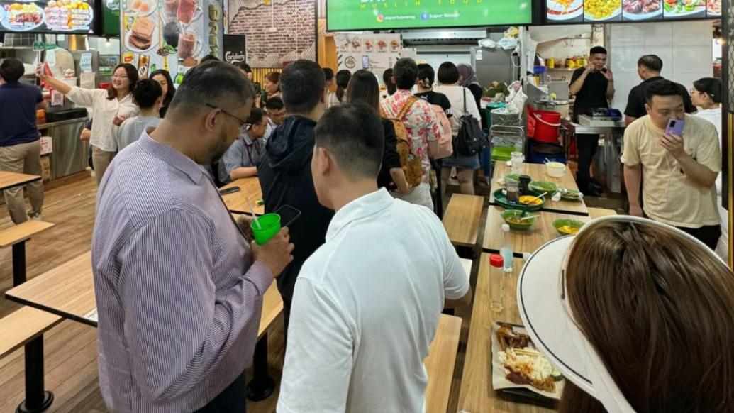 新加坡旅游搜索瞬间涨五倍，足球门将的椰浆饭成中国球迷“打卡”第一站