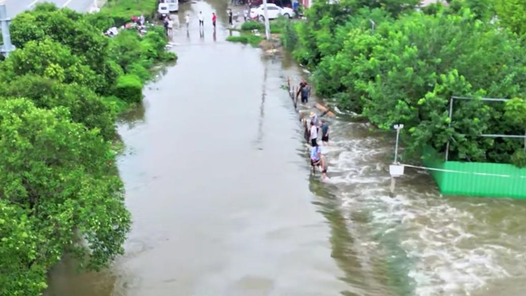 航拍丨河南社旗极端强降雨：街道变“河道”，农田变“水田”