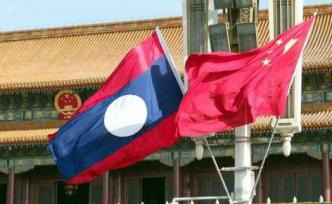 老挝人革党中央总书记、国家主席本扬会见王毅