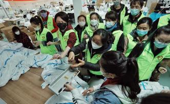 20天750人次经手近4万件防护服！上海志愿者干了件大事