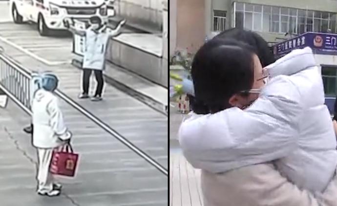 那對(duì)隔空擁抱的醫(yī)生夫妻，相聚了