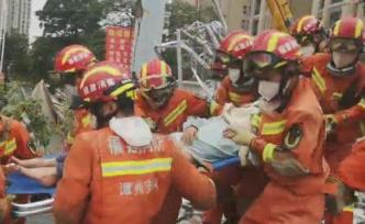 泉州塌楼救援现场：消防员接力生死8小时，一家三口成功获救