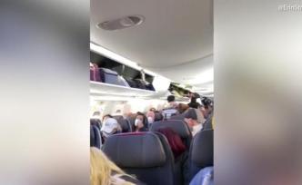 疫情期美国航空航班满员，乘客惊恐落泪