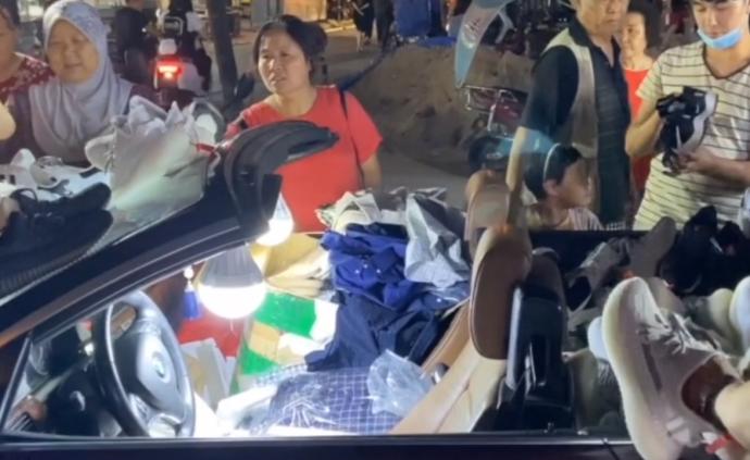 男子開敞篷寶馬擺地攤，市民：心疼車