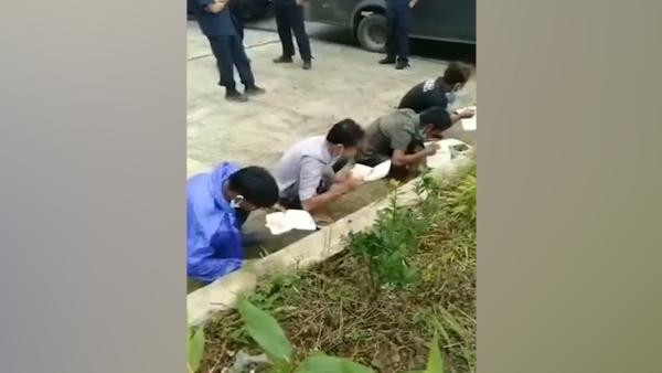 隔离点偷逃的四名缅甸人员被找到，蹲食盒饭画面曝光