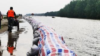 战汛｜江洲镇北岸水位高出河堤0.1米，已转移4732人