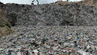 采石场复垦回填数万吨垃圾，国土部门称原方案系填土