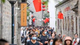 美媒：中国“黄金周”消费火爆，经济复苏将提振邻国
