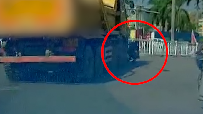 深圳一泥头车借道加油站，旁边男子被卷入车底当场身亡
